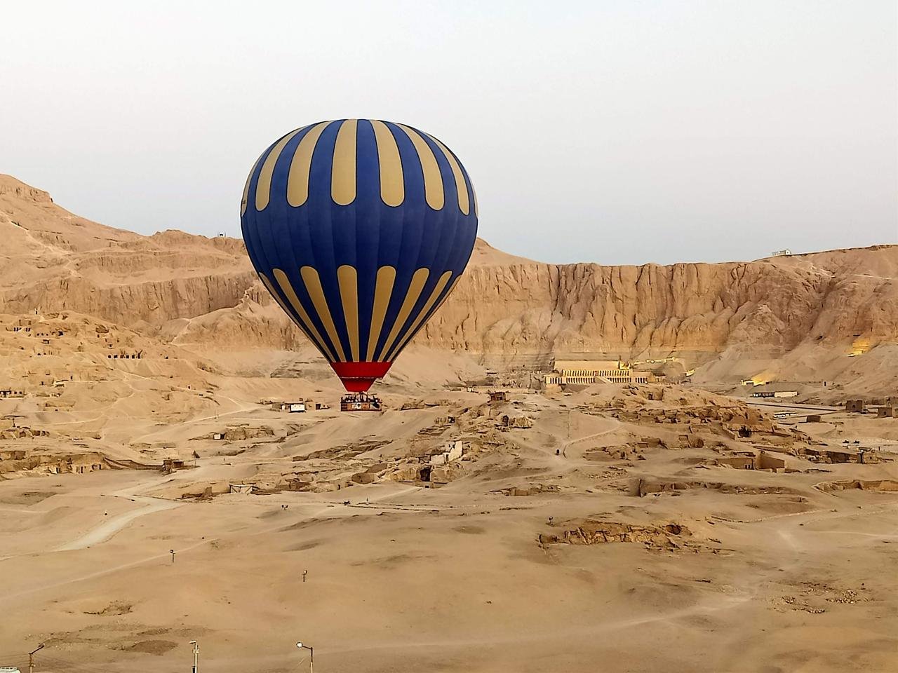 Hot air balloon flying over Luxor during a Nile cruise package